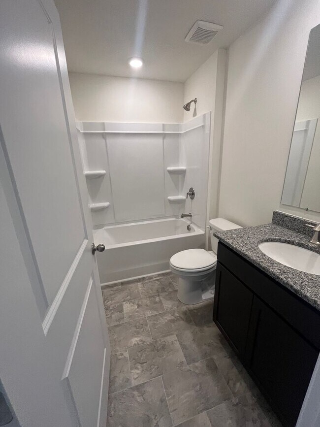 Building Photo - Brand New Townhome – Modern Comfort & Conv...