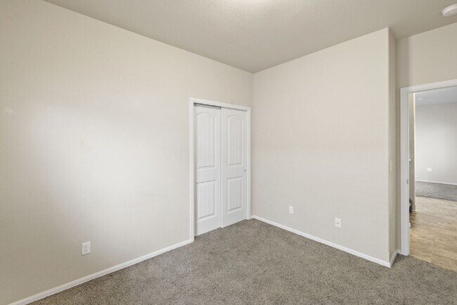 Building Photo - Spacious 4-Bedroom Home with Loft, Solar & Fenced Backyard