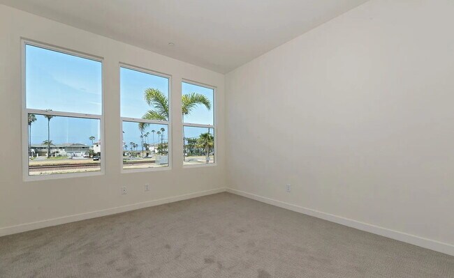 Building Photo - Ultimate Beach House! 3 Bed/3 Bath with Ocean Views from Every Floor, Panoramic Rooftop Deck, Dua...