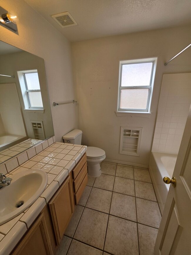 Building Photo - Spacious 3-Bedroom Home with RV Parking & 3-Car Garage in Bullhead City