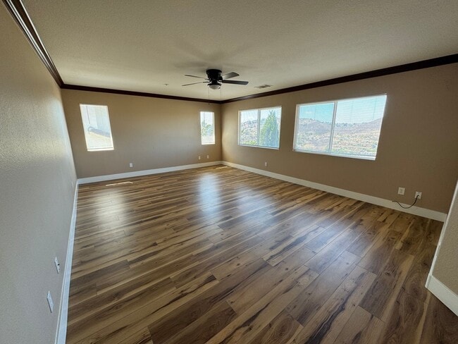 Building Photo - Gorgeous for 4 Bedroom and gated community