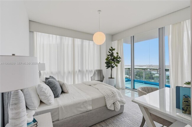 Building Photo - 10295 Collins Ave