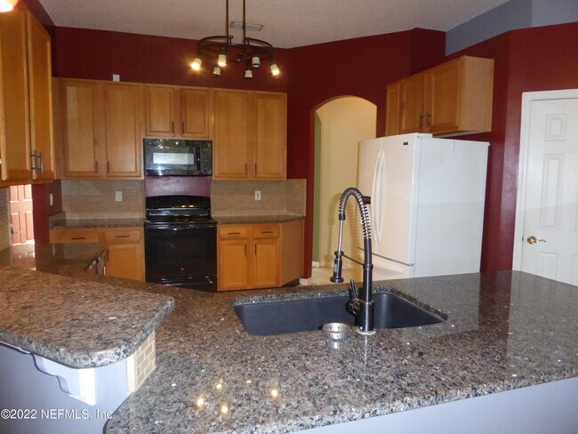 Building Photo - 8716 Canopy Oaks Dr