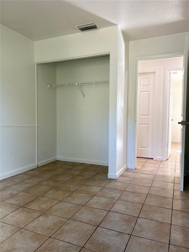 Building Photo - 6452 Royal Palm Beach Blvd