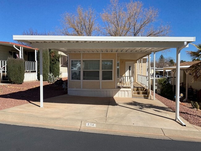 Building Photo - 55+ Park Town Home!