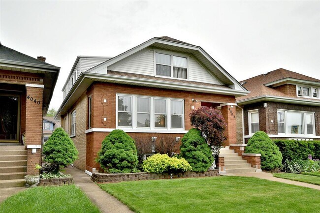 Home Exterior - Street View - 4044 N Mango Ave