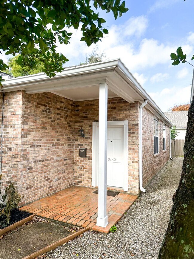 Primary Photo - Uptown Rental: 2BR Duplex with Parking & Yard