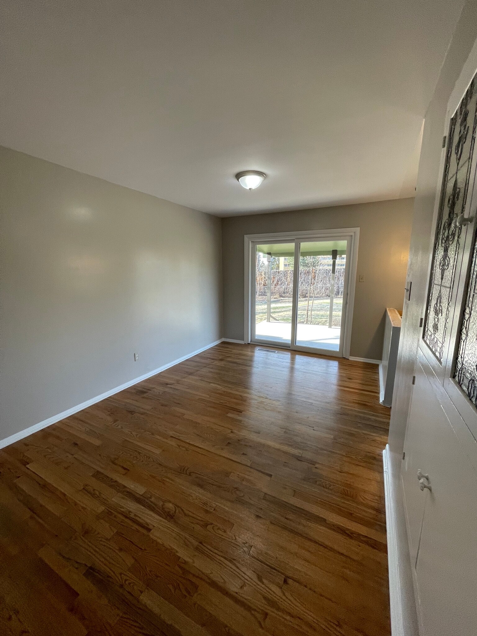 Dining room that has sliding door looking to outside - 7991 E Hampden Cir
