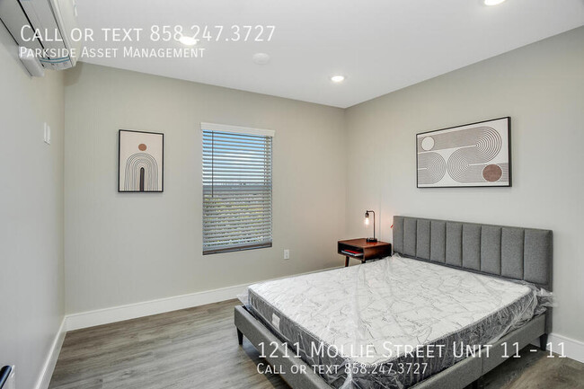 Building Photo - $1,000 Move-in Credit! The Carl on Lauretta