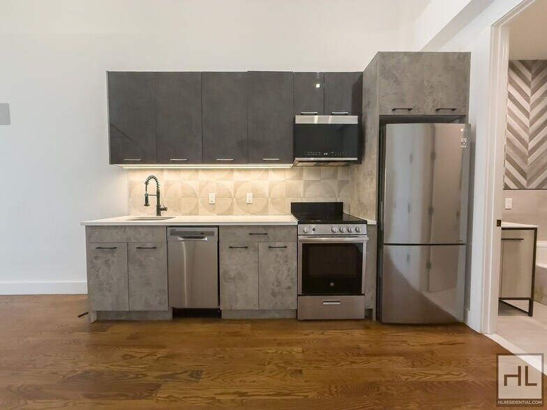 Building Photo - Stunning Two-Bedroom Duplex with Soaring 1...