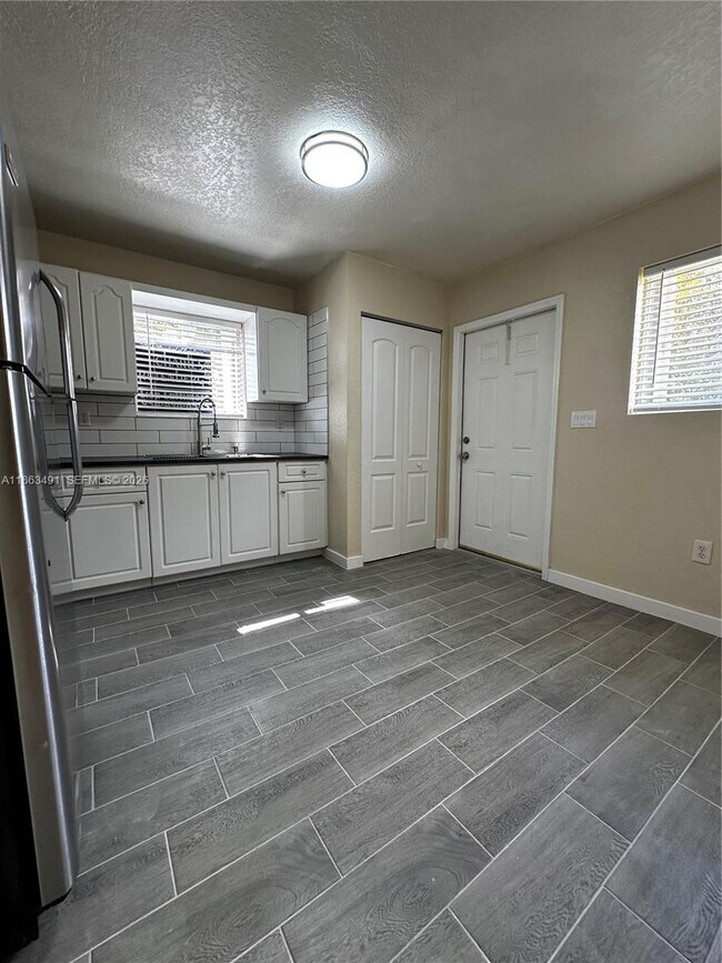 Building Photo - 1465 NW 59th St