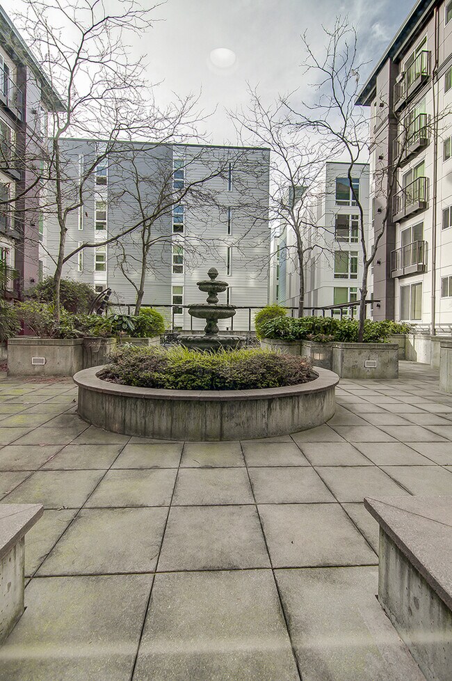 Building Photo - Top floor corner one-bedroom in the heart of it all, don't miss out, tour today!