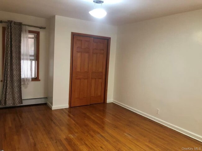 Building Photo - 229-02 Horace Harding Expy