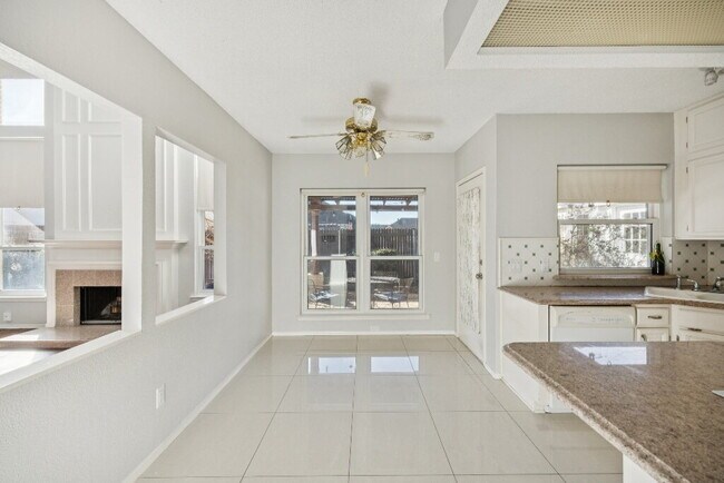 Building Photo - "Spacious 4-Bedroom, 2.5-Bath Living Meets Storybook Backyard Charm!"