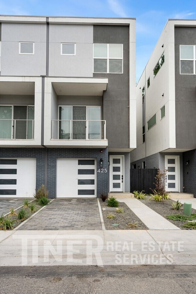 Building Photo - Elegant Modern Living