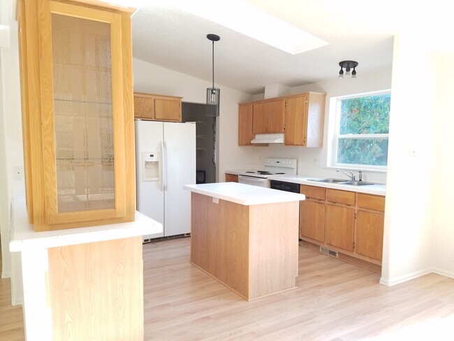 Spacious, bright kitchen, with skylight and a - 7614 81st Ave NW