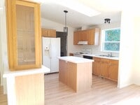Spacious, bright kitchen, with skylight and a - 7614 81st Ave NW