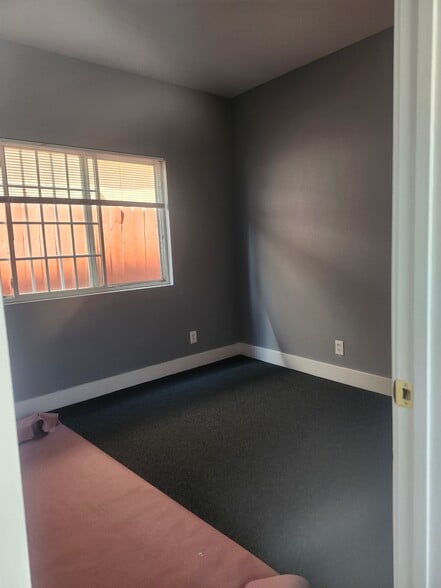 One of 3 bedrooms - 10609 S Main St