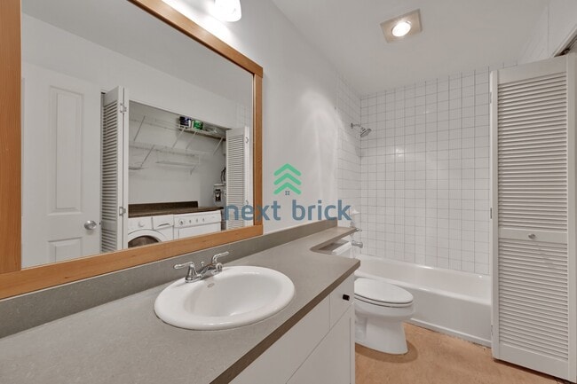 Building Photo - Live Easy in This Beautiful 2-Bedroom Condo