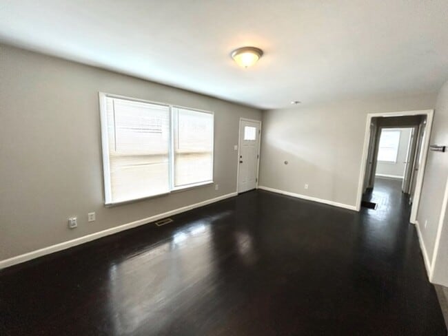 Building Photo - FOUR BEDROOM ONE AND HALF BATH BRICK RANCH HOME