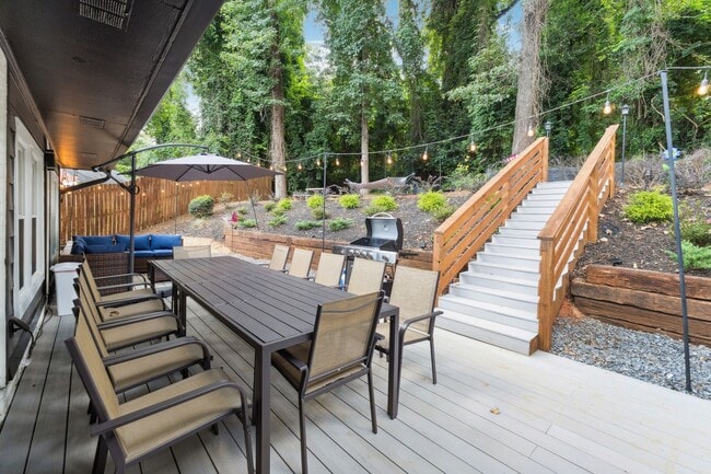 Building Photo - Fully Furnished: Beautiful 4-Bedroom Home ...