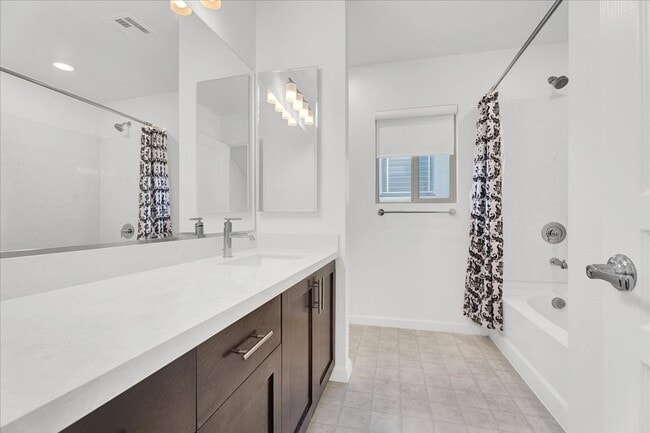 Building Photo - Stunning 4-Bedroom Home in Gated Community Near I-215 & Top Amenities!