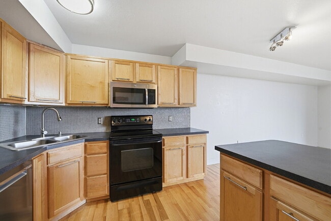 Building Photo - $1,545.95 with Free the first month's rent, 1 Bed - 1 Bath, Condo in Denver with Washer and Dryer!