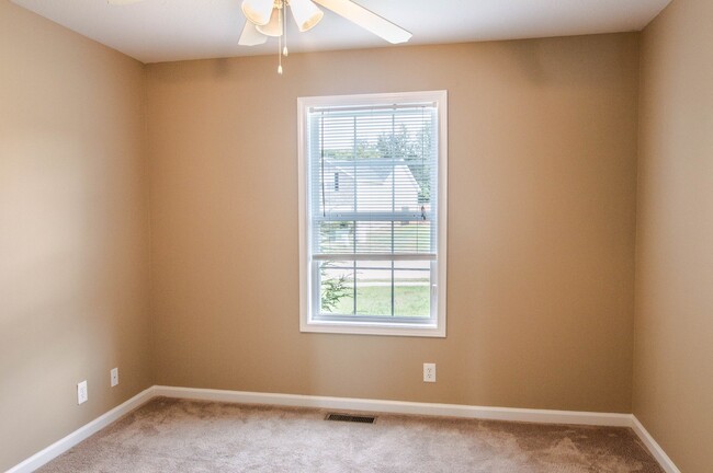 Building Photo - Pet Friendly Three Bedroom with Bonus!