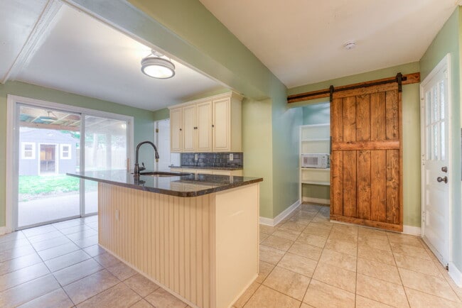Building Photo - "Charming 4-Bedroom Sanctuary on Boyce Roa...