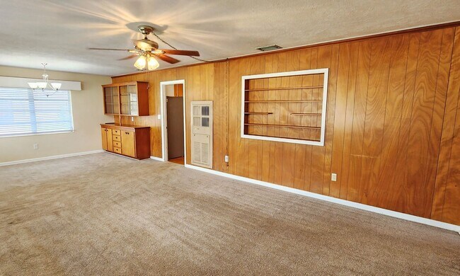 Building Photo - Wonderful 60s Throwback 2/2 on large corner lot with fenced yard