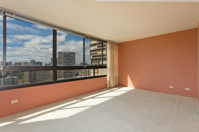 Building Photo - Royal Iolani Corner Unit - 2 PRK w/ ALL Ut...