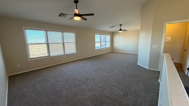 Building Photo - Spacious Surprise home with large backyard