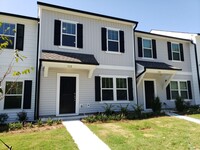 Building Photo - NEW 3 Bedroom Townhome Minutes from Downto...