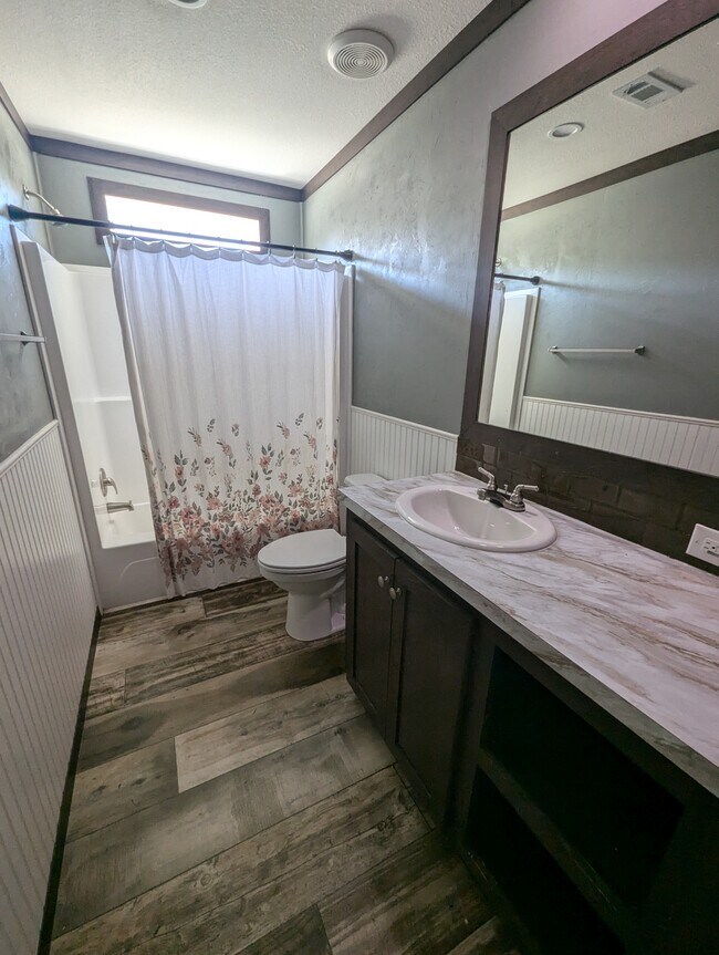 Guest Bathroom built in storage, shower/tub combo - 179 Davis Rd