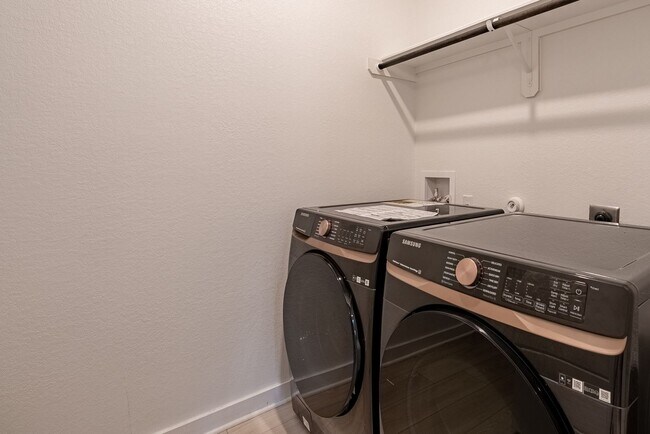 Building Photo - Spacious Buda Beauty Offering Open-Concept Living and Flexible Space for Every Lifestyle!