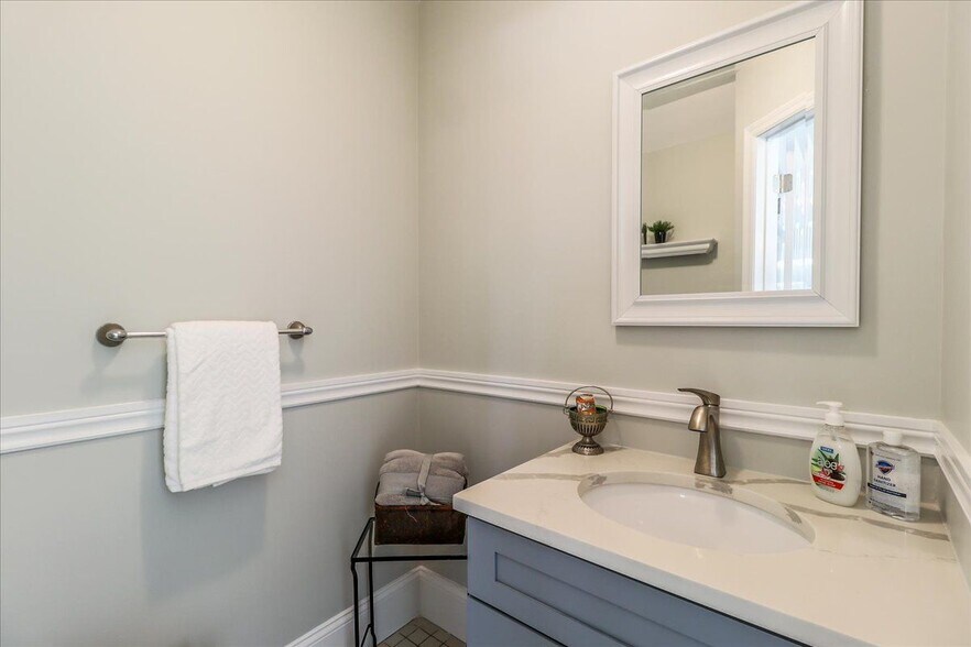 Half bath with pretty vanity - 20 Raymond Plz