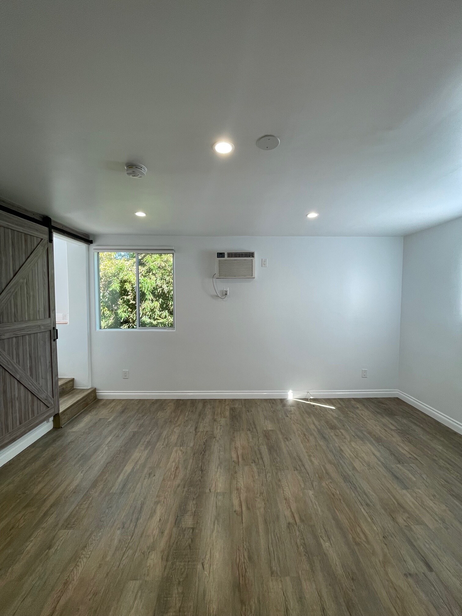 LIVING ROOM WITH AC - 205 7th Ave