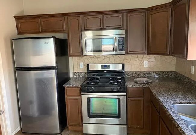 Building Photo - 14207 North Point Ave