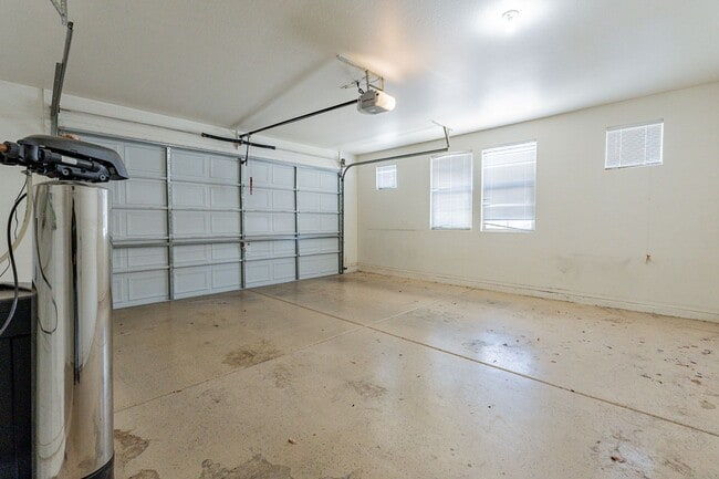 Building Photo - Four Bedrooms, 3 Car Garage - New flooring!