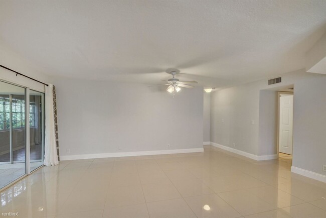 Building Photo - 3 br, 2 bath Condo - 17266 Boca Club Blvd ...