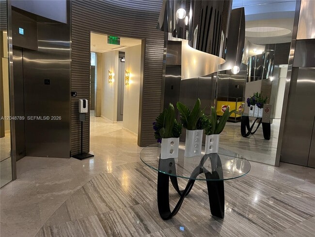 Building Photo - 10275 Collins Ave