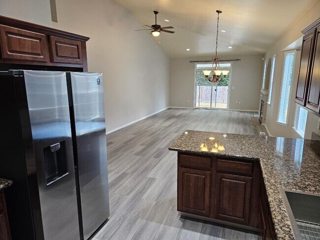 Building Photo - Spacious Tacoma Home with Gas Fireplace, 3-Car Garage & Covered Patio!