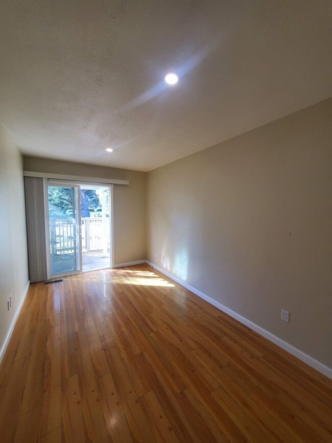 Building Photo - Private 2x2 Santa Rosa Townhouse with pool, 2-car garage, workshop area, fireplace, W/D Hookups