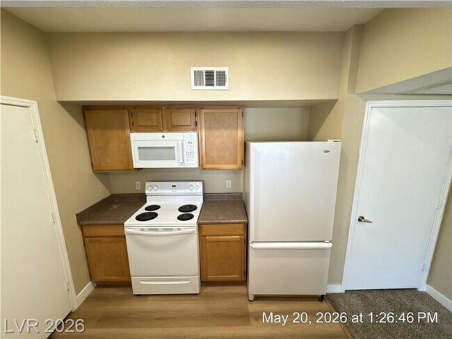 Building Photo - Gated Green Valley Condo with Dual Walk-In Closets & Resort Amenities