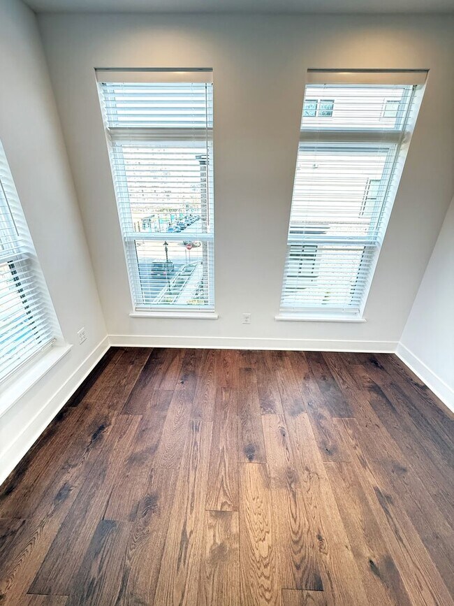 Building Photo - Brand new 4 level, 4 Bedroom Townhome with Elevator!