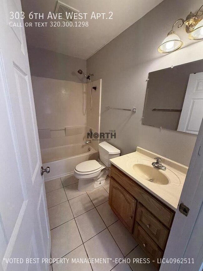 Building Photo - 303 6th Ave W