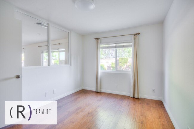 Building Photo - A Captivating and Charming 2 Story Home Ne...