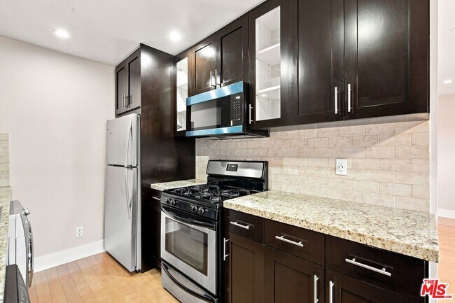 Building Photo - 3131 S Canfield Ave