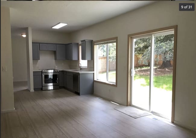 Building Photo - $500 OFF First 2 Months – Spacious 4BR/3BA Home with BRAND-NEW Carpet Throughout, Fenced Yard & 2...