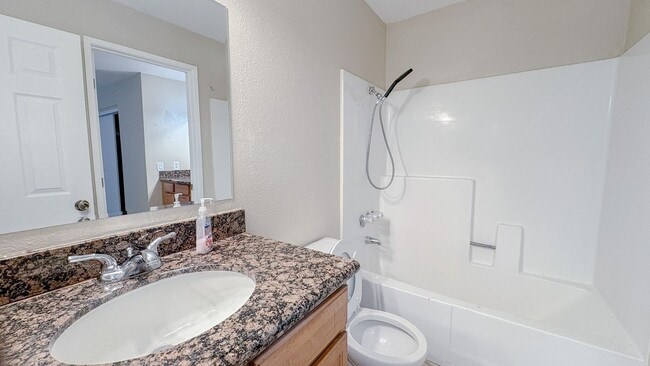 Building Photo - Low rent! Fully Renovated 2BR Condo Gated ...
